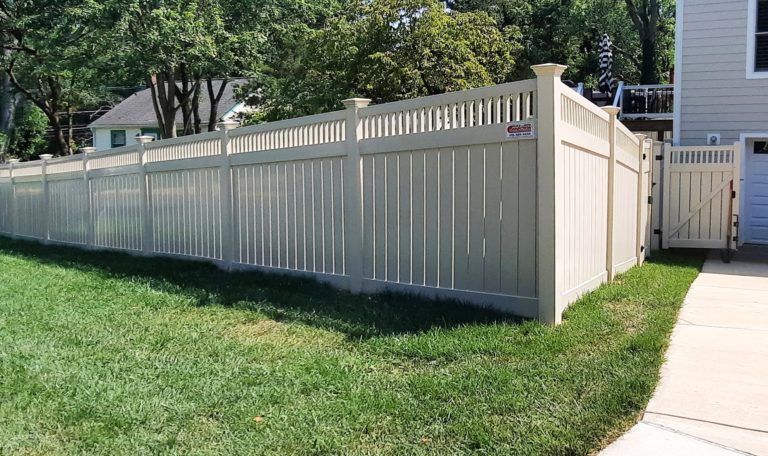 6 foot high 6 inch semi privacy tan vinyl fencing with closed tan vinyl square spindles plus single walk gate-min