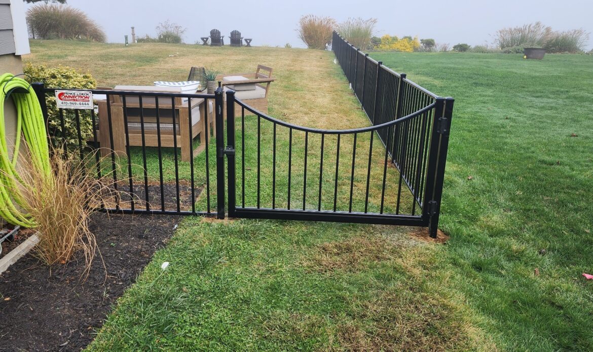 2-rail flat top Ascot style black aluminum fence with scalloped dop gate