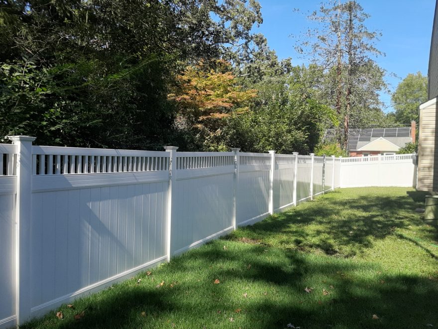 2 - White vinyl privacy fence with Closed Spindle topper