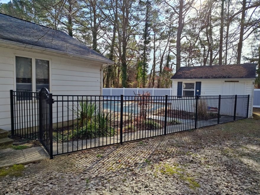 54 high black aluminum Ascot style pool code fence with one 4ft wide arched top walk gate to include lockable keystone latch