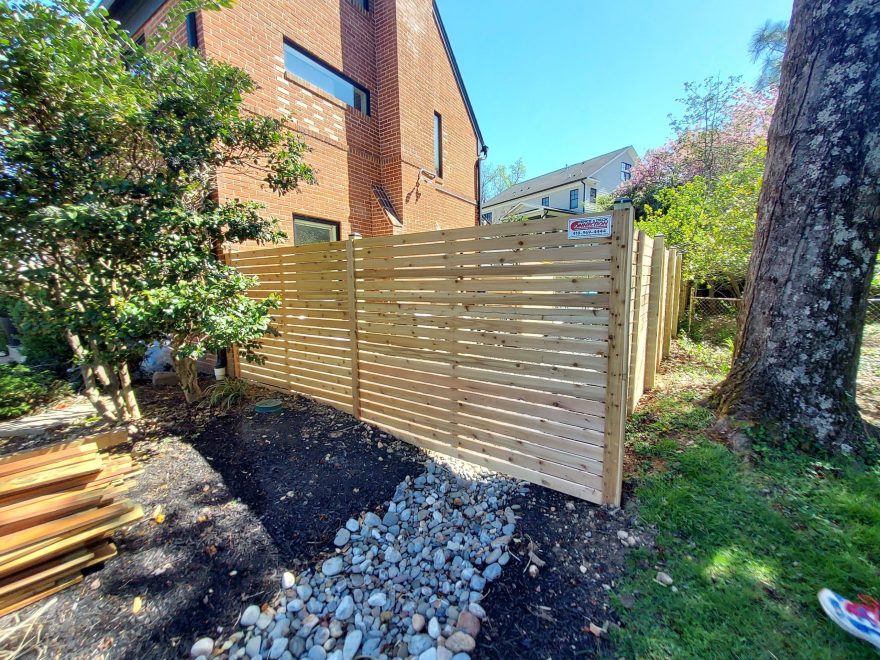 6 foot high cedar horizontal fencing with spaced 1x4 horizontal cedar boards