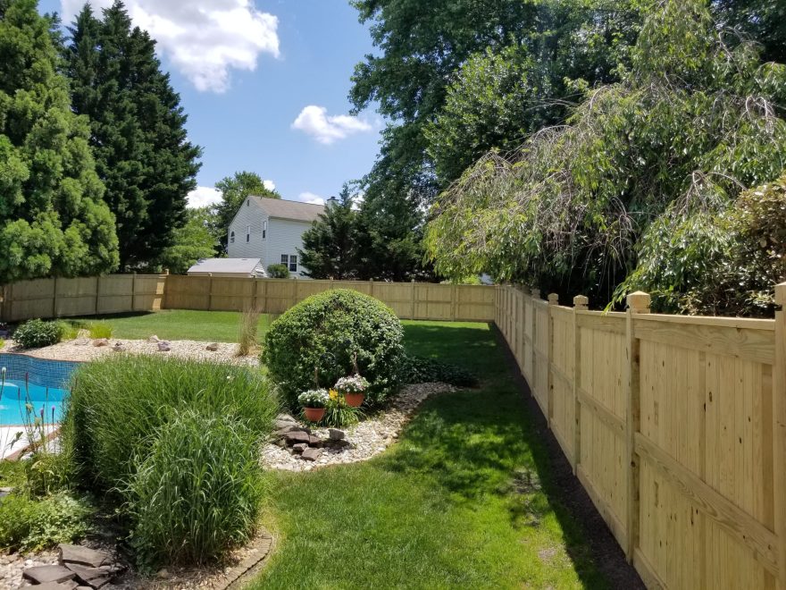 Custom Vertical Board Pressure Treated Fence with Dado Custom 6 x 6 Posts + Mid Rail and Cap Rail