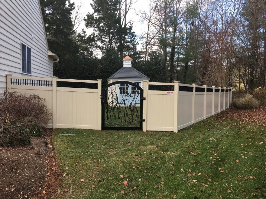 Tan Vinyl Privacy Fence with Black Aluminum Spindle Top and Custom Arched Aluminum Gate