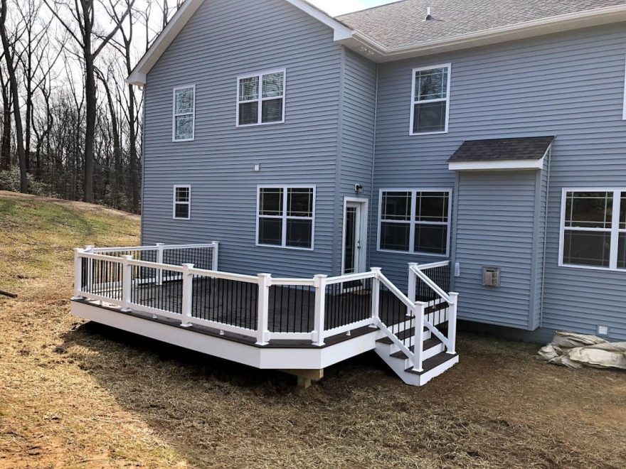 TimberTech Terrain Rustic Elm Decking with White Washington Vinyl Railing with Black Aluminum Balusters + White Vinyl Fascia Wrap