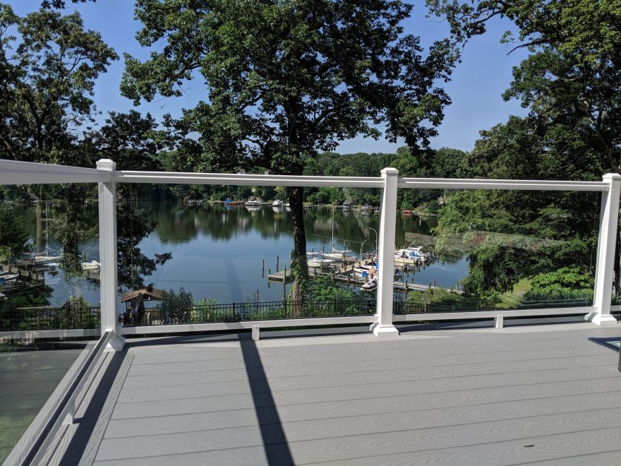 Trex Select Pebble Gray Decking with White Ultralox Aluminum Railing with Full Glass Panels in Severna Park MD