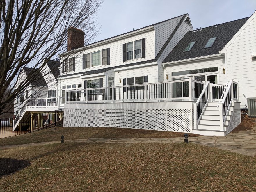 Trex Transcend Island Mist Deck Boards with White Washington Vinyl Railing and Black Round Aluminum Balusters in Glenwood, MD 2