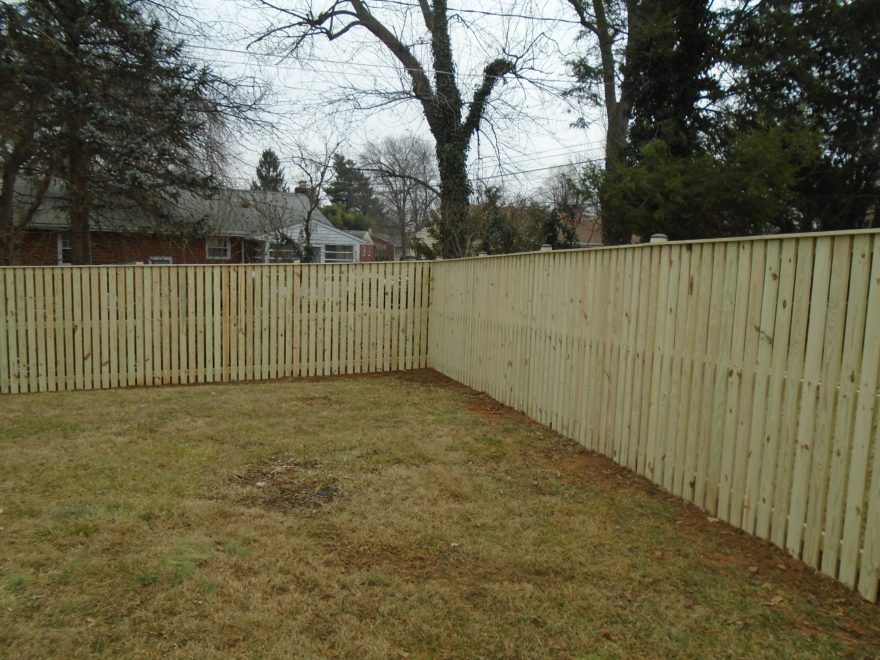 Vertical Board Spaced Picket Wood Fence with Cap Board 2