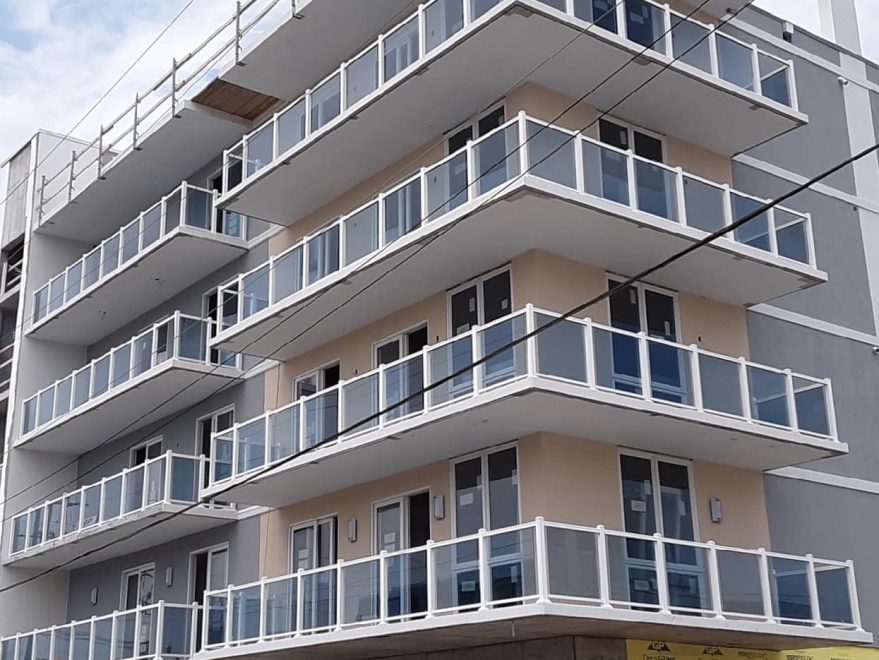 Waves Condominiums on 125th Street Bayside Ocean City MD Ultralox railing with Ocean Blue glass progress shot