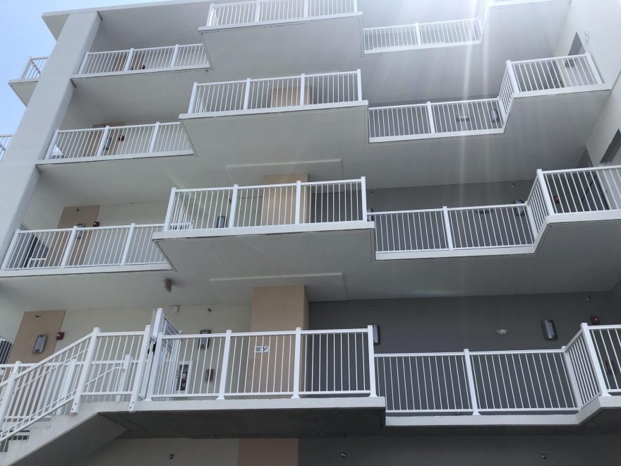 White Aluminum Balcony Railing on the back side of Ocean Waves in Ocean City MD