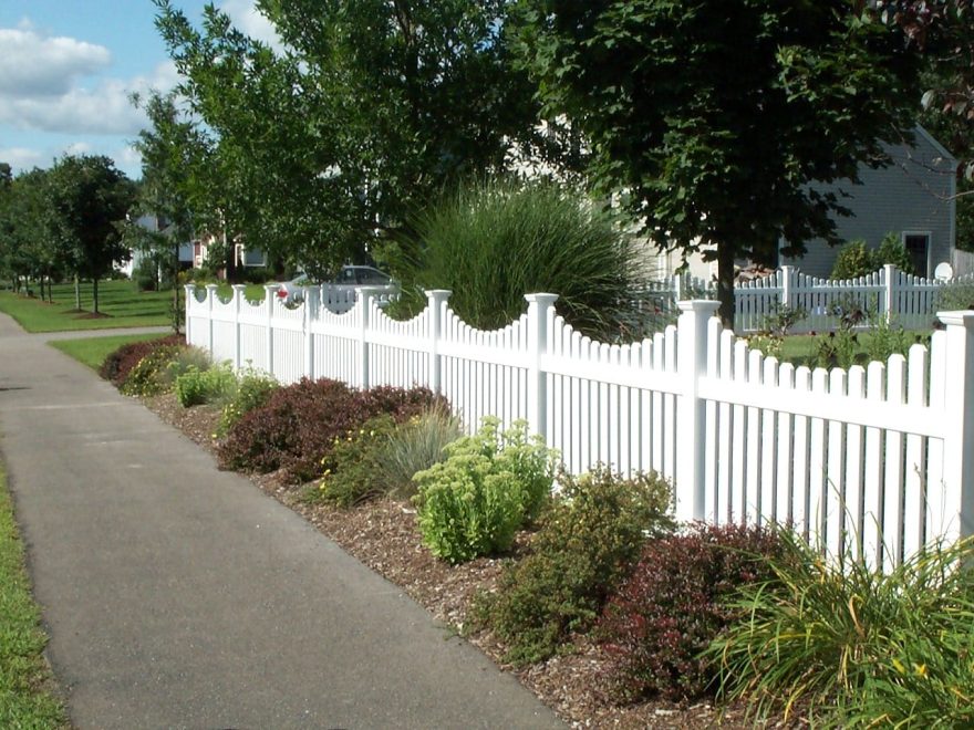 White vinyl scalloped picket fence